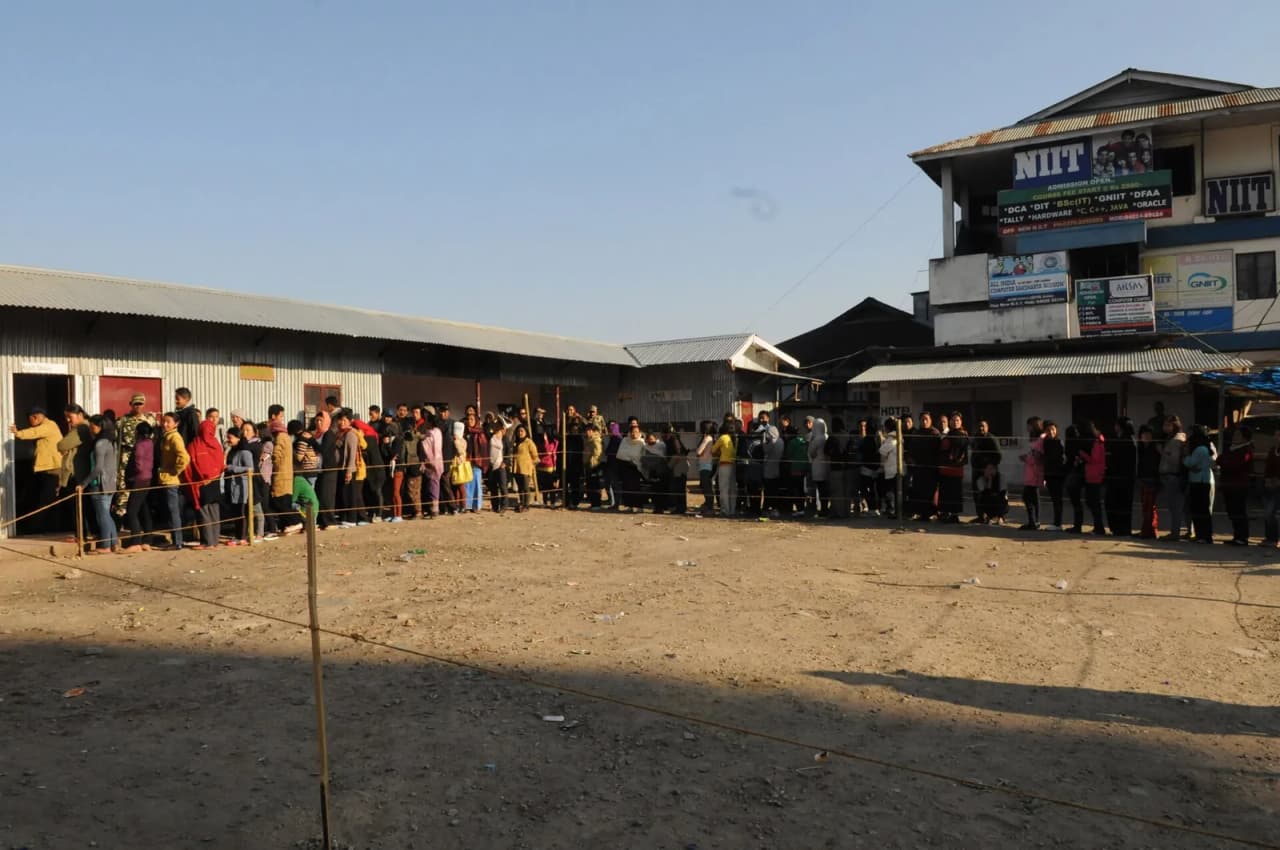 Voters queue at a polling booth in Western Angami, Kohima, during the 2013 Nagaland Assembly election